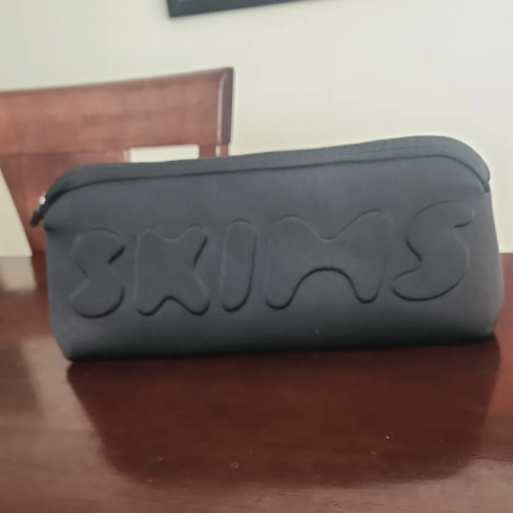 SKIMS Black Neoprene Cosmetic Bag Travel Makeup Toiletry Pouch Minimalist
